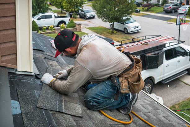 Professional Roofing technician working in Laconia, NH